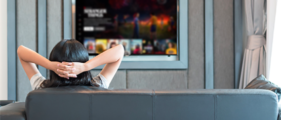 woman using nomadix casting to watch tv
