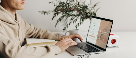 man looking at computer